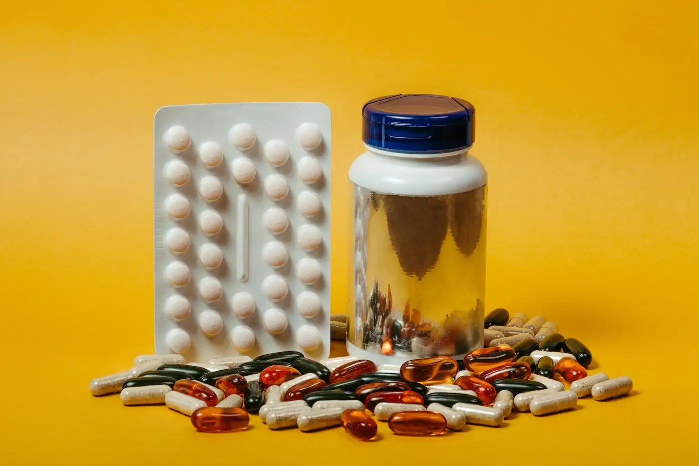 Optometrist reading the back label of an eye-vitamin bottle